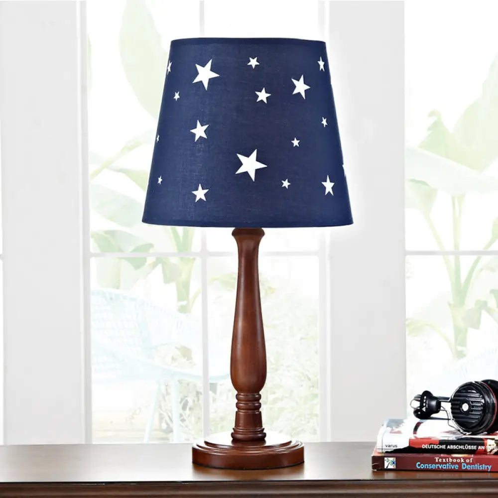 rustic farmhouse table lamps for cozy kitchensrustic farmhouse table lamps for cozy kitchensGiulia - Blue Barrel Shade Night Table Lamp with Star Pattern