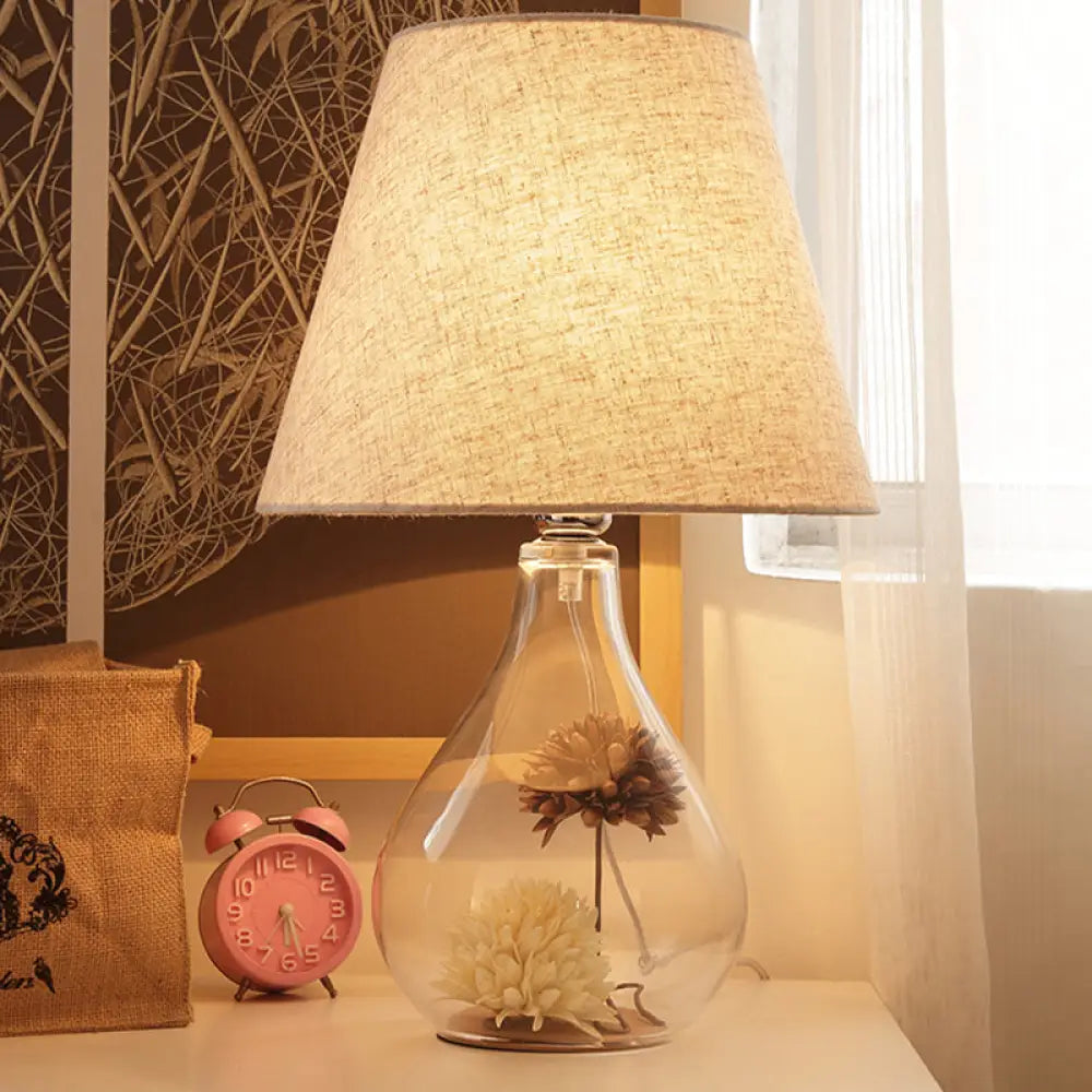 mid century modern table lamps with iconic designs for a stylish studymid century modern table lamps with iconic designs for a stylish studyFrançoise - Clear Waterdrop Glass Table Light with Dried Flower Decor